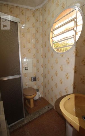 Casa à venda com 250m², 5 quartos e 4 vagasBanheiro (piso superior)