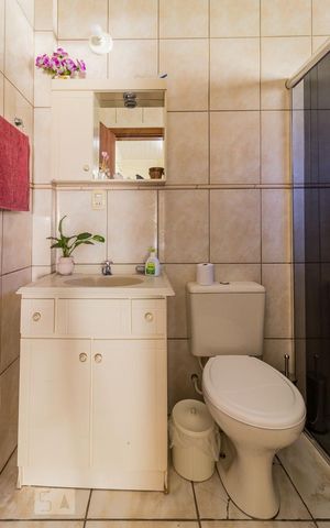 Casa à venda com 287m², 4 quartos e 4 vagas Casa à venda com 287m², 4 quartos e 4 vagasBanheiro de Serviço