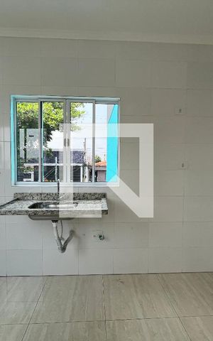 Casa de condomínio à venda com 58m², 2 quartos e 1 vagaCozinha e Área de Serviço