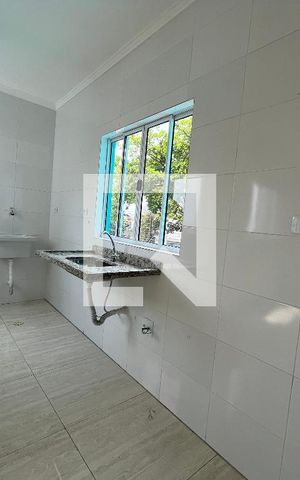 Casa de condomínio à venda com 58m², 2 quartos e 1 vagaCozinha e Área de Serviço