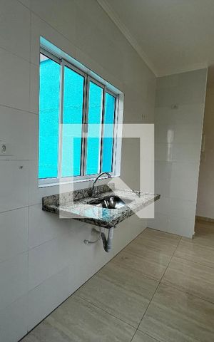 Casa de condomínio à venda com 58m², 2 quartos e 1 vagaCozinha e Área de Serviço