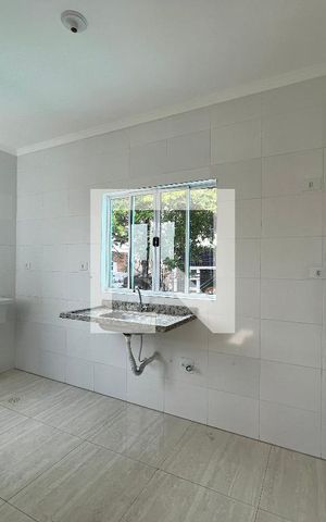 Casa de condomínio à venda com 58m², 2 quartos e 1 vagaCozinha e Área de Serviço