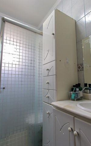 Casa à venda com 250m², 3 quartos e 2 vagas Casa à venda com 250m², 3 quartos e 2 vagasBanheiro da Suite 2