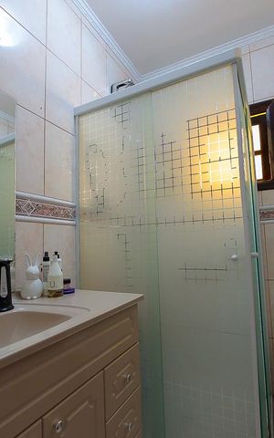 Casa à venda com 250m², 3 quartos e 2 vagas Casa à venda com 250m², 3 quartos e 2 vagasBanheiro da Suite 1