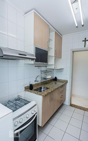 Apartamento à venda com 55m², 2 quartos e 1 vaga Apartamento à venda com 55m², 2 quartos e 1 vagaCozinha