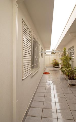 Casa à venda com 400m², 5 quartos e 4 vagas Casa à venda com 400m², 5 quartos e 4 vagasQuintal
