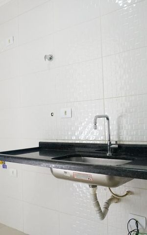 Casa de condomínio para alugar com 55m², 2 quartos e 1 vagaCozinha