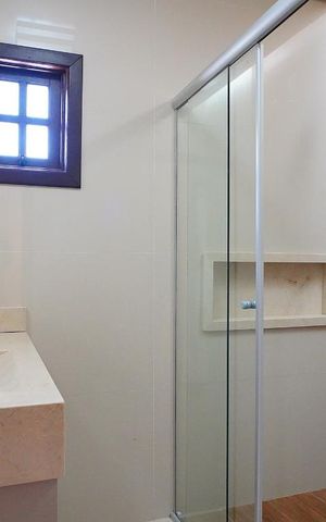 Casa à venda com 295m², 4 quartos e 4 vagasBanheiro