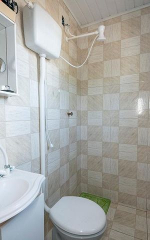 Casa à venda com 200m², 3 quartos e 2 vagasBanheiro
