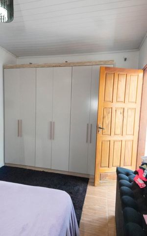 Casa à venda com 200m², 3 quartos e 2 vagasQuarto 2