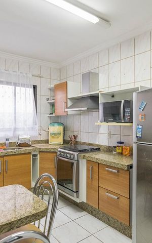Casa de condomínio à venda com 260m², 4 quartos e 2 vagas Casa de condomínio à venda com 260m², 4 quartos e 2 vagasCozinha