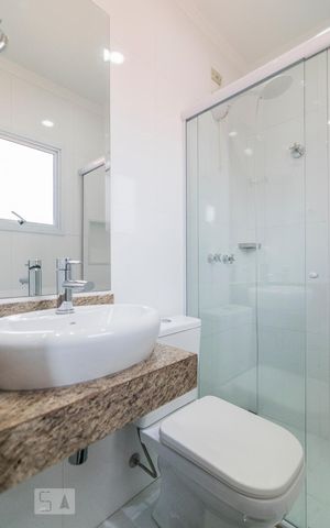 Casa de condomínio à venda com 260m², 4 quartos e 2 vagas Casa de condomínio à venda com 260m², 4 quartos e 2 vagasBanheiro da Suíte 4