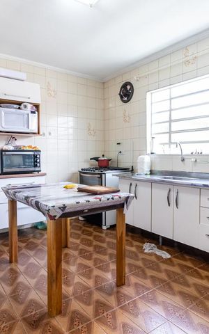 Casa à venda com 148m², 3 quartos e 2 vagas Casa à venda com 148m², 3 quartos e 2 vagasCozinha