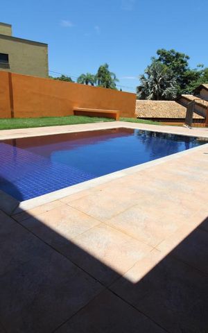 Casa de condomínio para alugar com 332m², 4 quartos e 5 vagasPiscina