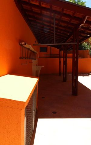 Casa de condomínio para alugar com 332m², 4 quartos e 5 vagasÁrea de Serviço descoberta