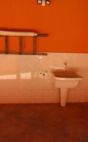 Casa de condomínio para alugar com 332m², 4 quartos e 5 vagasÁrea de Serviço descoberta