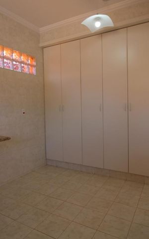Casa de condomínio para alugar com 332m², 4 quartos e 5 vagasCozinha