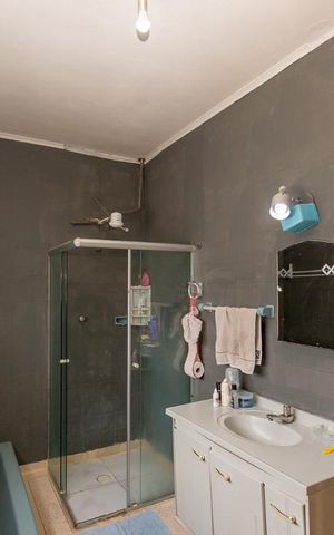 Casa à venda com 230m², 4 quartos e 2 vagas Casa à venda com 230m², 4 quartos e 2 vagasBanheiro