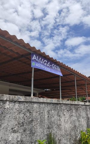 Casa para alugar com 65m², 2 quartos e 1 vagaPlaquinha em Fachada frente Rua principal