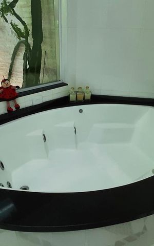Casa à venda com 350m², 4 quartos e 4 vagasBanheiro Suite 1