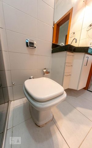 Casa de condomínio à venda com 68m², 2 quartos e 1 vagaBanheiro Social