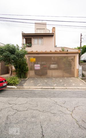 Casa à venda com 351m², 4 quartos e 4 vagas Casa à venda com 351m², 4 quartos e 4 vagasFachada