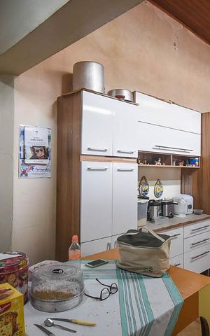 Casa à venda com 189m², 3 quartos e 2 vagas Casa à venda com 189m², 3 quartos e 2 vagasCozinha