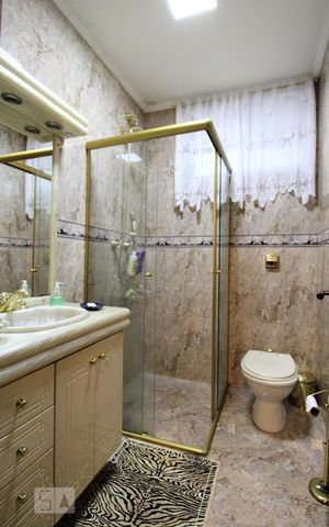 Casa à venda com 347m², 4 quartos e 3 vagasBanheiro 4