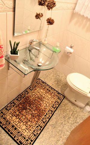 Casa à venda com 347m², 4 quartos e 3 vagasBanheiro