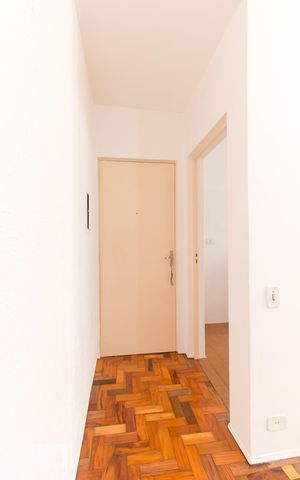 Apartamento para alugar com 59m², 2 quartos e 1 vagaEntrada do apartamento e cozinha