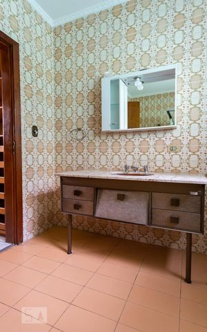 Casa à venda com 310m², 3 quartos e 4 vagasBanheiro da Suíte
