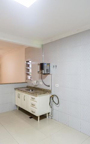 Casa à venda com 110m², 3 quartos e 2 vagas Casa à venda com 110m², 3 quartos e 2 vagasCozinha