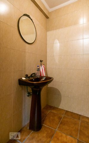 Casa à venda com 458m², 4 quartos e 8 vagas Casa à venda com 458m², 4 quartos e 8 vagasLavabo da Garagem