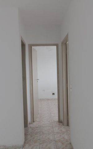 Apartamento para alugar com 47m², 2 quartos e 1 vagaCorredor de acesso aos quartos 