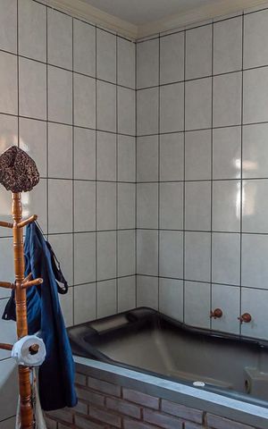 Casa à venda com 386m², 4 quartos e 7 vagas Casa à venda com 386m², 4 quartos e 7 vagasBanheiro da Suíte 3