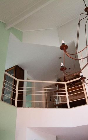 Casa de condomínio à venda com 256m², 4 quartos e 2 vagas Casa de condomínio à venda com 256m², 4 quartos e 2 vagasSala