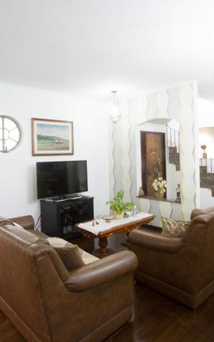 Casa à venda com 308m², 5 quartos e 2 vagasSala
