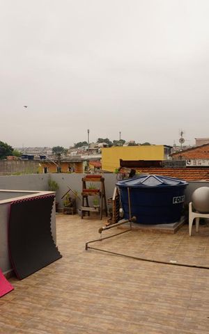 Casa à venda com 425m², 4 quartos e 4 vagasÁrea Aberta da Sala de TV