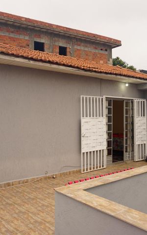 Casa à venda com 425m², 4 quartos e 4 vagasÁrea Aberta da Sala de TV