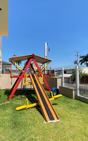 Casa de condomínio à venda com 108m², 3 quartos e 2 vagasÁrea Comum - Playground
