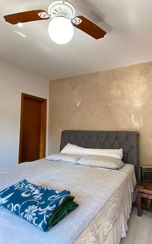 Casa à venda com 75m², 2 quartos e 2 vagasQuarto 1 - Suíte