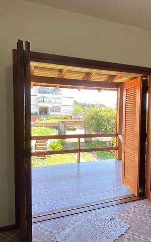 Casa à venda com 75m², 2 quartos e 2 vagasPorta Janela da Sala