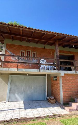 Casa à venda com 75m², 2 quartos e 2 vagasFachada