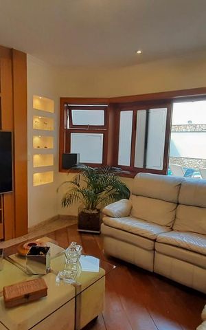 Casa à venda com 460m², 4 quartos e 6 vagasSala TV