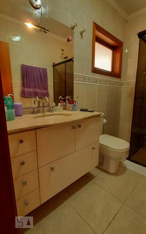 Casa à venda com 460m², 4 quartos e 6 vagasBanheiro Suite 1
