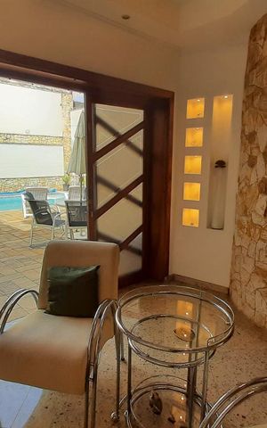 Casa à venda com 460m², 4 quartos e 6 vagas Sala 1