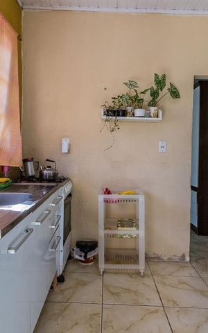Casa à venda com 319m², 4 quartos e 4 vagas Casa à venda com 319m², 4 quartos e 4 vagascozinha da edícula