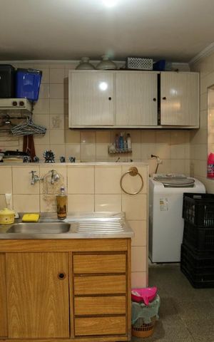 Casa à venda com 200m², 4 quartos e 3 vagasCozinha e Área de Serviço