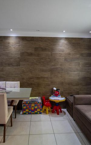 Casa de condomínio à venda com 118m², 4 quartos e 2 vagasSala