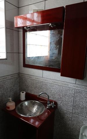 Casa à venda com 300m², 5 quartos e 4 vagasBanheiro suite
